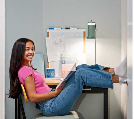 A woman sitting at a desk